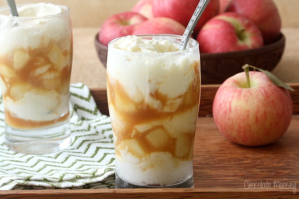 Caramel Apple Cheesecake with a spoon in a parfait glass