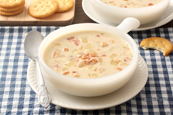 Cream Of Onion Soup with bacon in white bowl