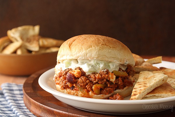 Greek Sloppy Joes made with ground lamb, peperoncini, feta cheese, and cucumber yogurt sauce