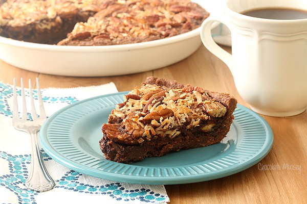 Slice of German Chocolate Pecan Pie on teal plate