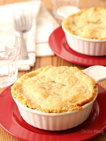Chicken Pot Pie For Two in ramekins on red plates
