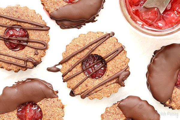Chocolate Covered Strawberry Linzer Cookies made with hazelnut flour and strawberry jam