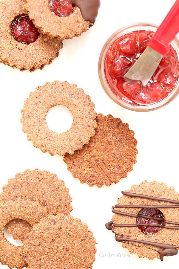 Chocolate Covered Strawberry Linzer Cookies made with hazelnut flour and strawberry jam