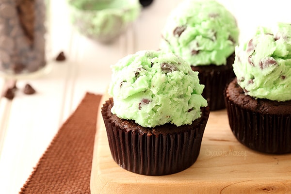 Chocolate mint cupcakes with scoop of mint buttercream frosting