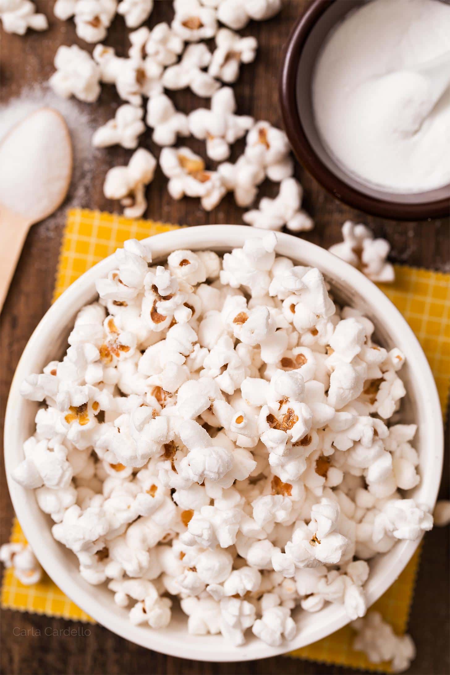 Overflowing bowl of salt and vinegar popcorn