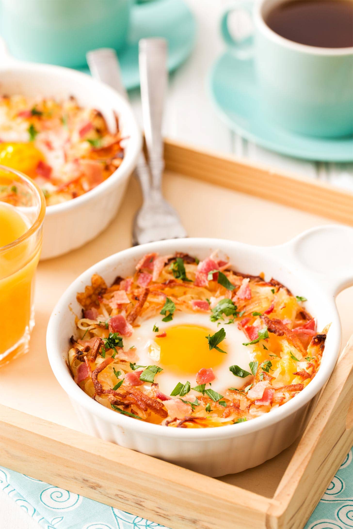 Breakfast bowls with shredded hash browns and baked egg