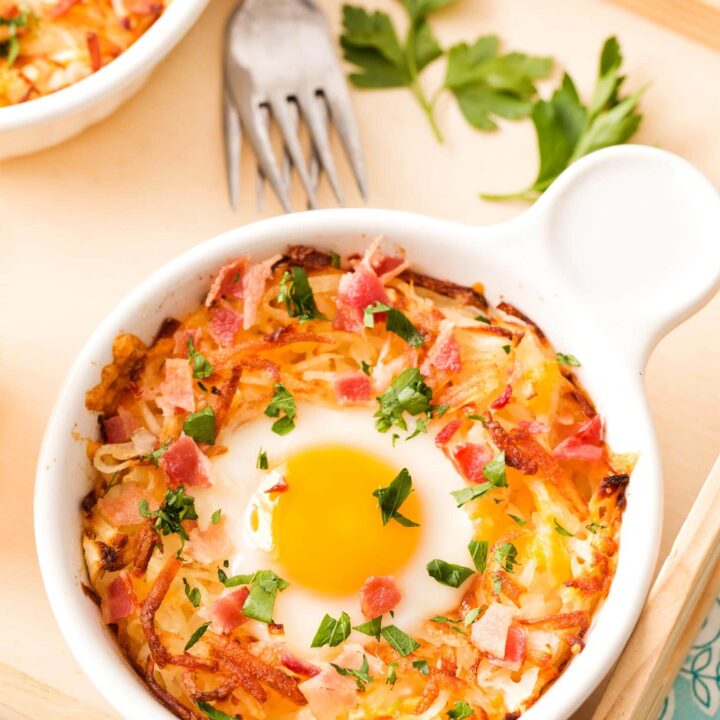 Hash brown bowls with baked egg in middle