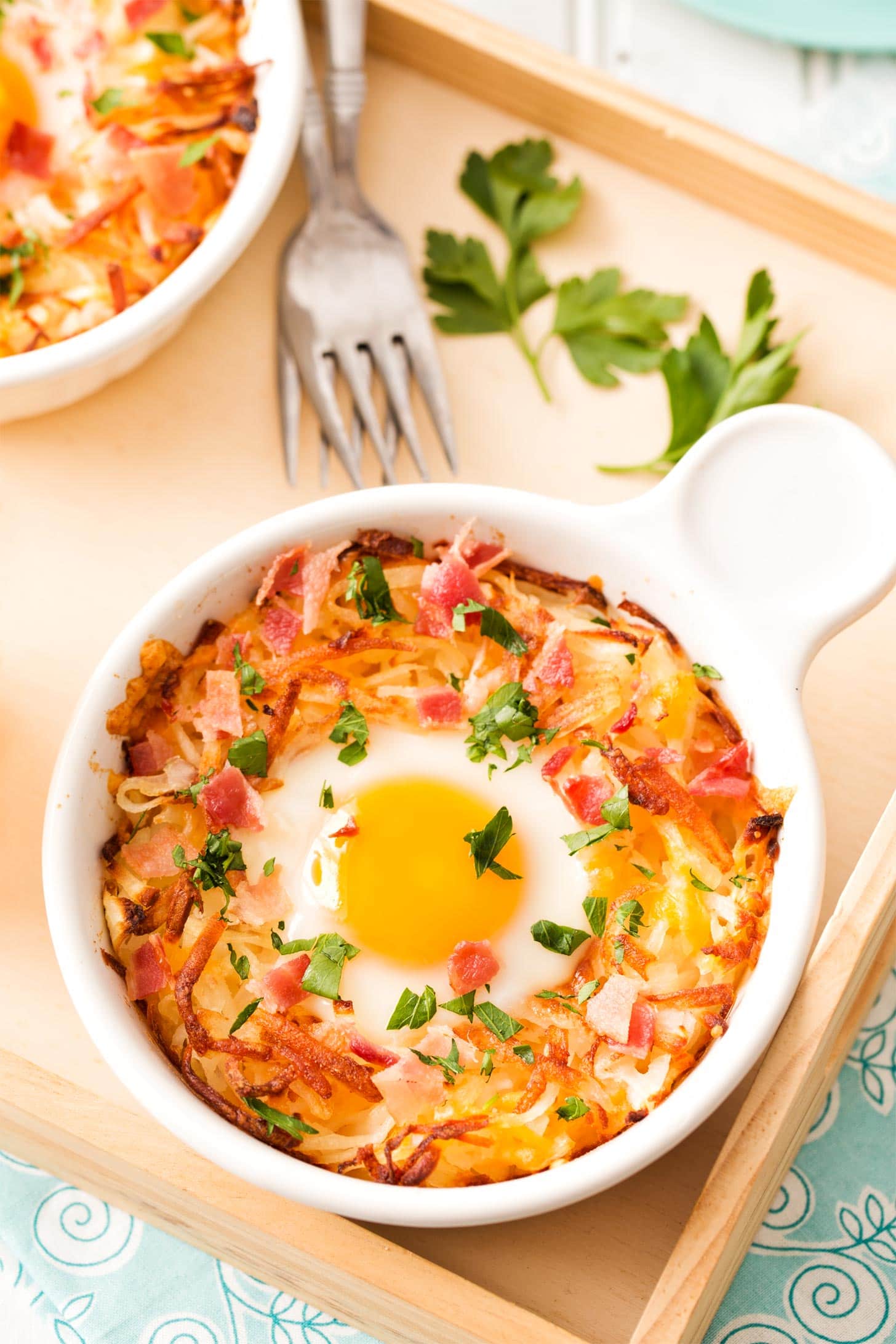 Hash brown bowls with baked egg in middle