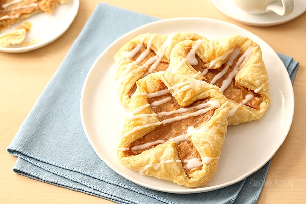 Puff Pastry Cream Cheese Danish on white plate with blue linen