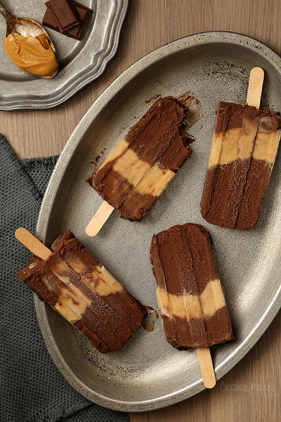 Chocolate Peanut Butter Fudgesicles that taste like eating a peanut butter cup on a stick