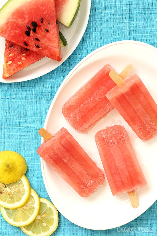 Margarita Popsicles on a plate with lemon slices