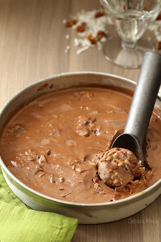 German chocolate cake ice cream in a round pan with ice cream scooper