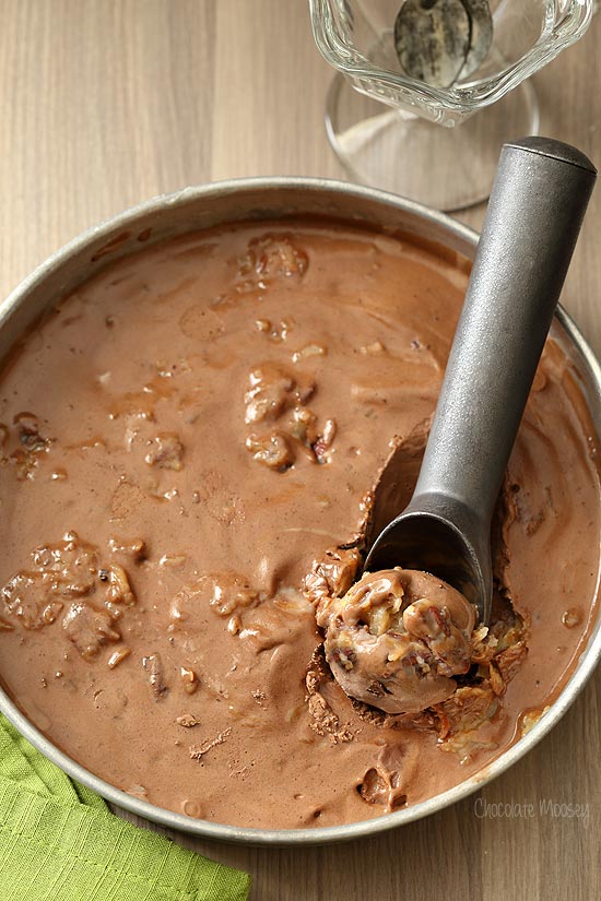 German chocolate ice cream in a round pan with ice cream scooper