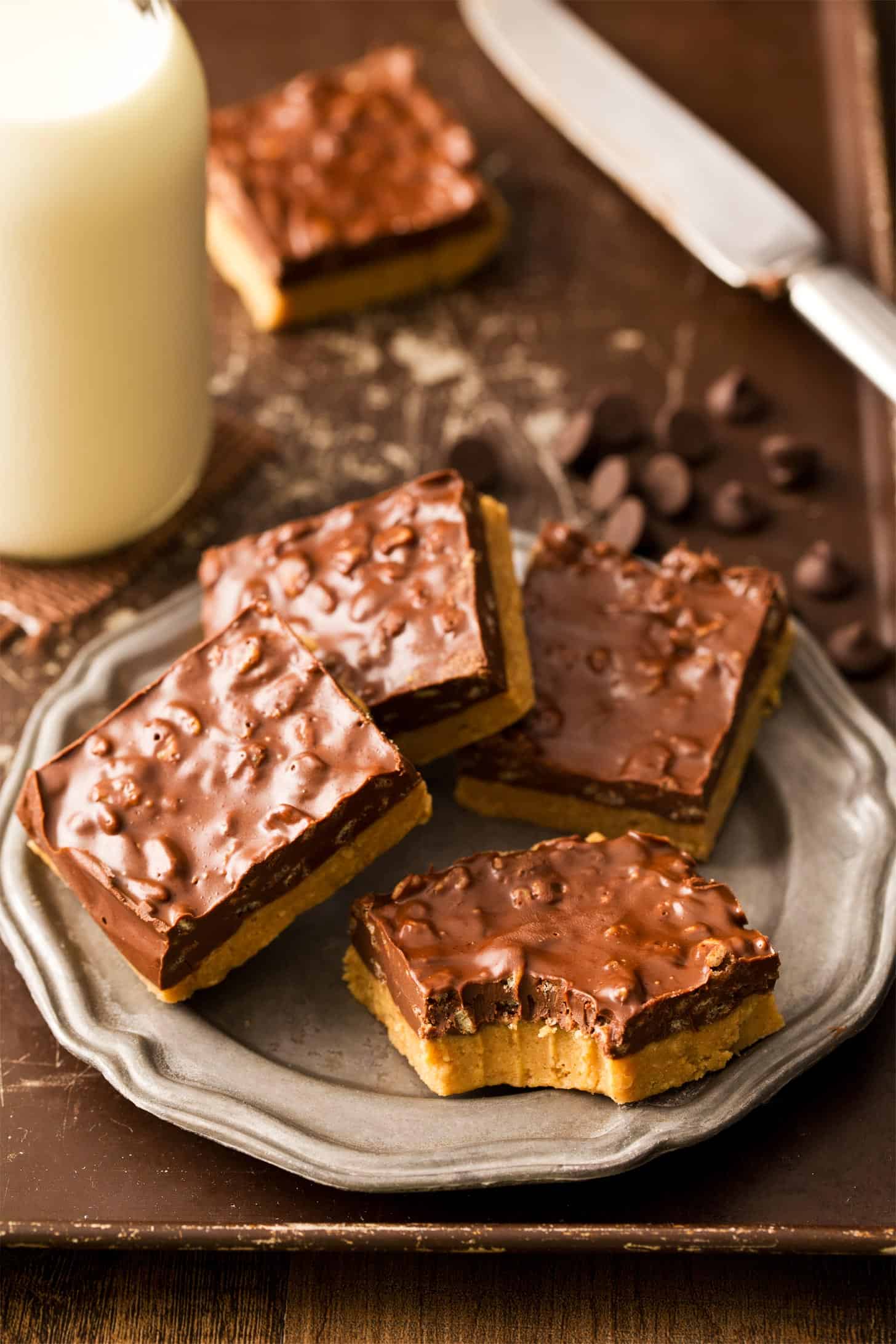 Peanut butter chocolate bars with bite taken out