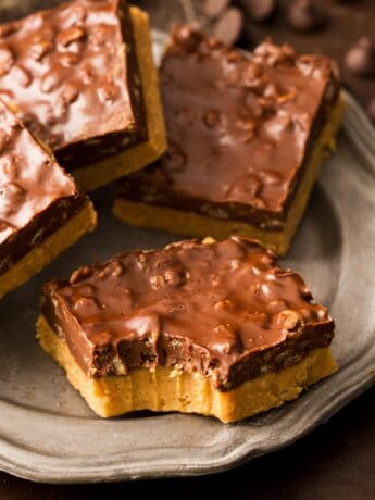 Close up of no bake chocolate peanut butter bars with bite taken