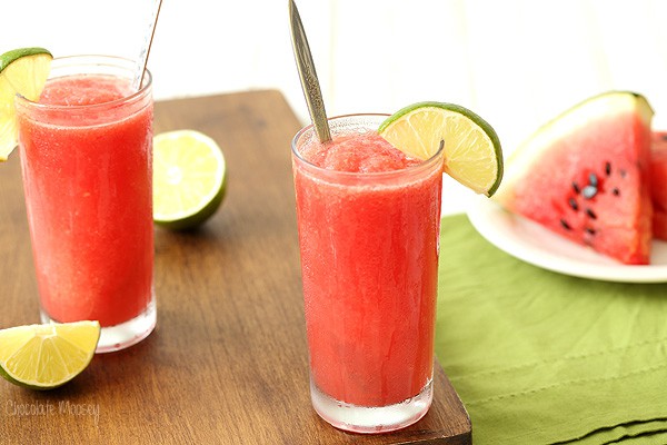 Watermelon Slushies in two glasses with spoons