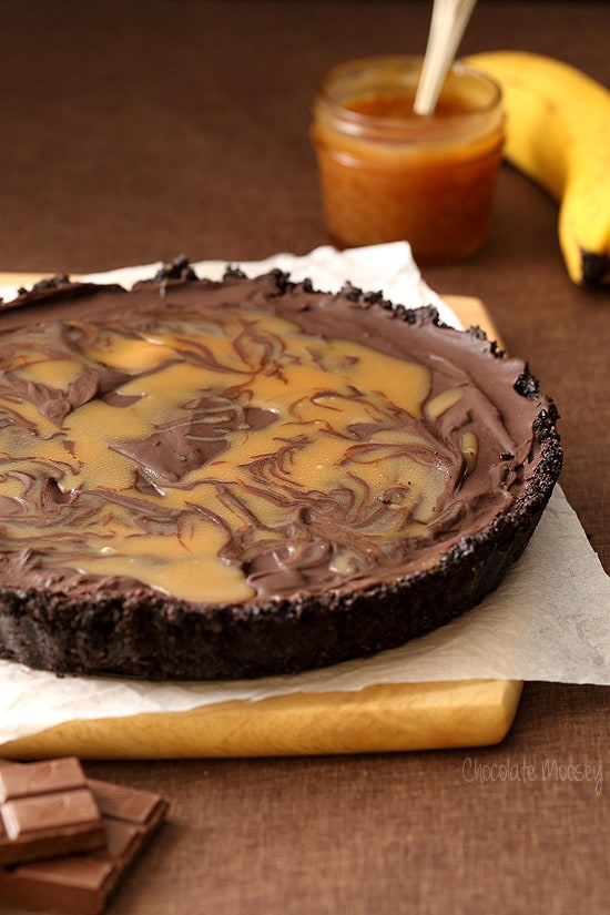 No Bake Chocolate Banana Caramel Tart with a caramel swirl