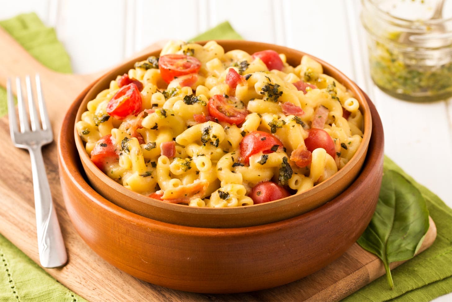 Macaroni with basil pesto in a bowl
