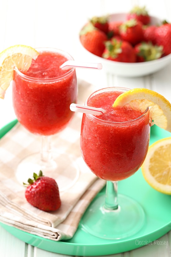 Two glasses strawberry slush on turquoise tray