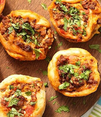 Taco Pizza Roll Ups with ground beef, salsa, and cheese