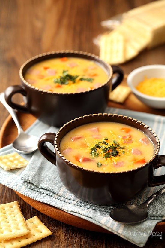 two bowls of ham and cheese soup