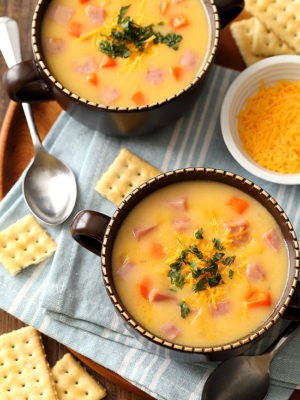 two bowls of ham and cheese soup
