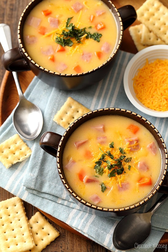 two bowls of ham and cheese soup