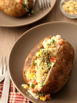 Chicken Pot Pie Baked Potatoes For Two have the components of a pot pie without making a pie crust. Learn how to make baked potatoes in the oven and in the microwave for an easy weeknight dinner for two.