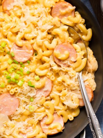 Close up of kielbasa mac and cheese in skillet
