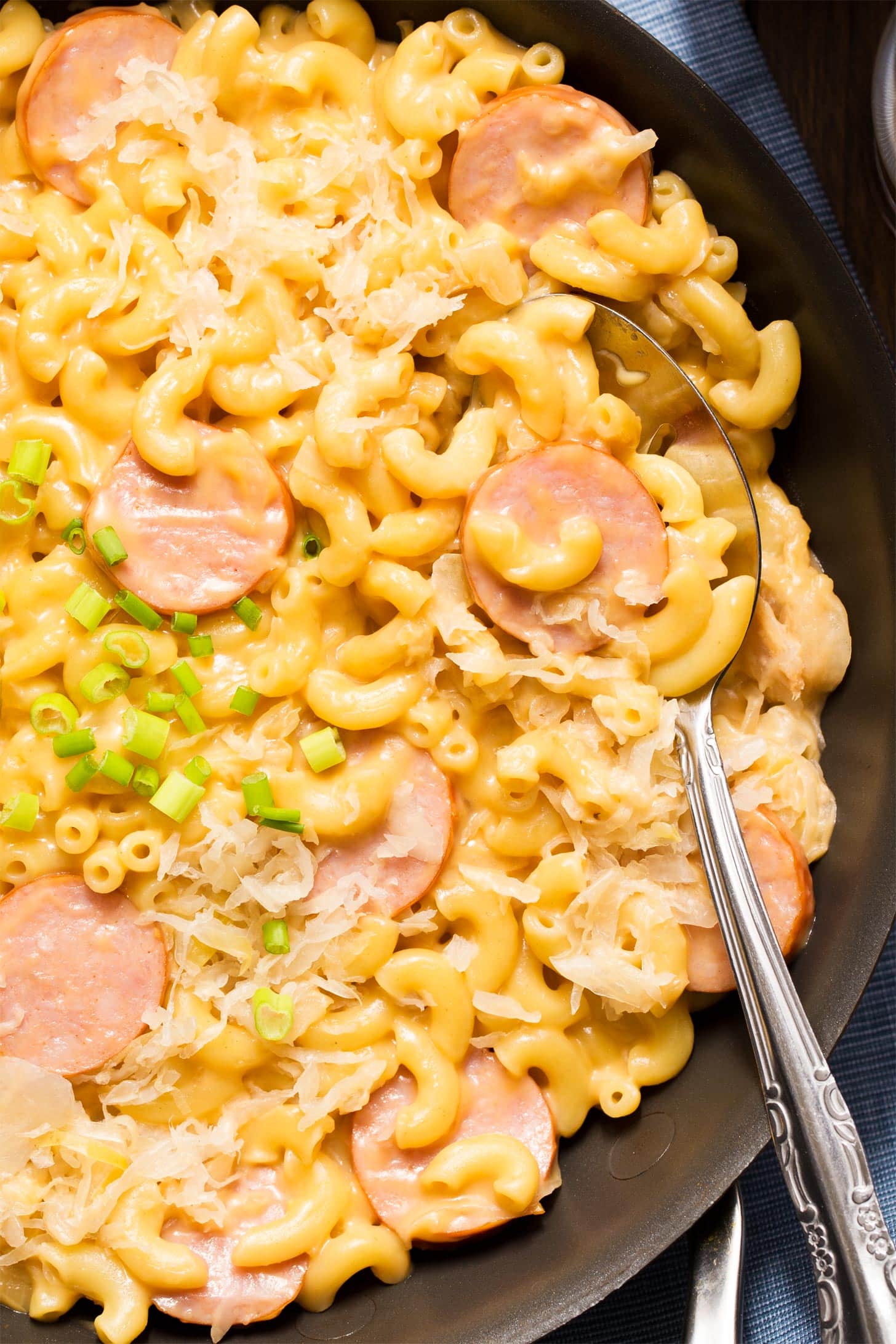 Close up of kielbasa mac and cheese in skillet