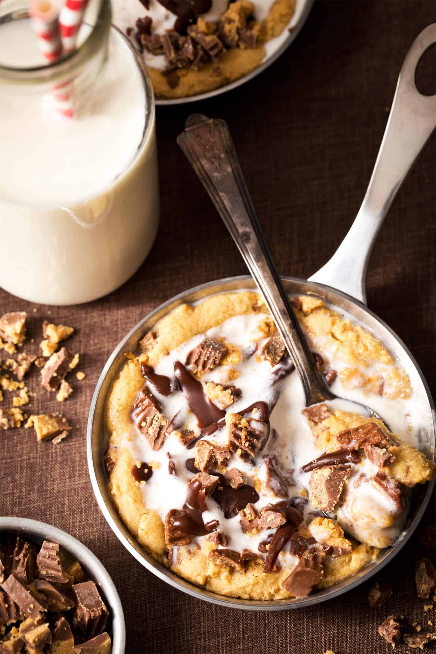 Peanut butter skillet cookie with spoon