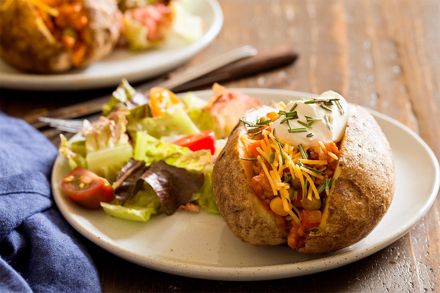 Cottage pie baked potato with side salad