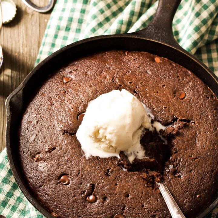 Chocolate skillet cake in cast iron with ice cream