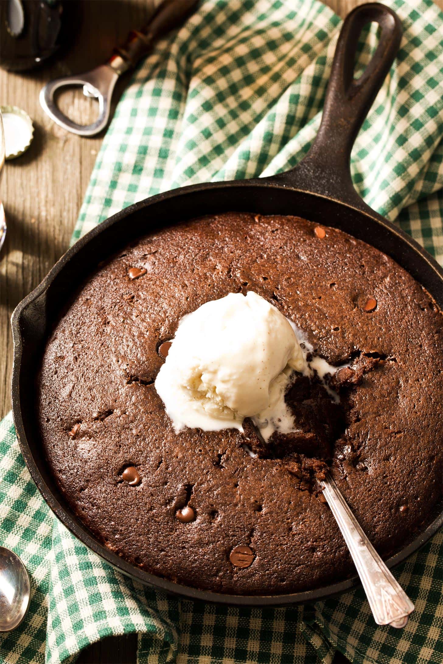 Chocolate skillet cake in cast iron with ice cream