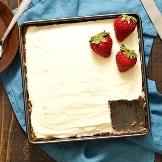 Strawberry Snack Cake in 8x8 pan with piece missing