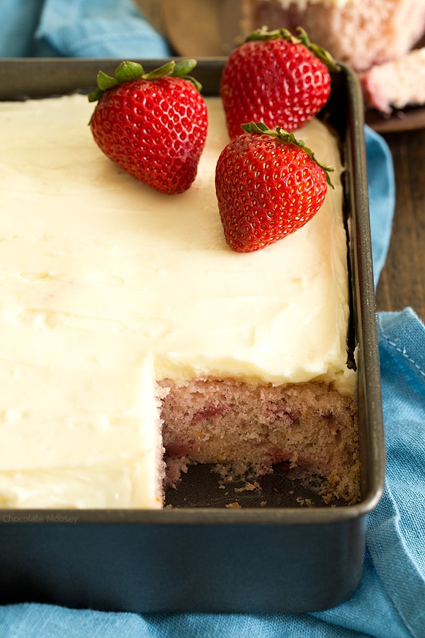 Close up of strawberry snack cake with missing piece