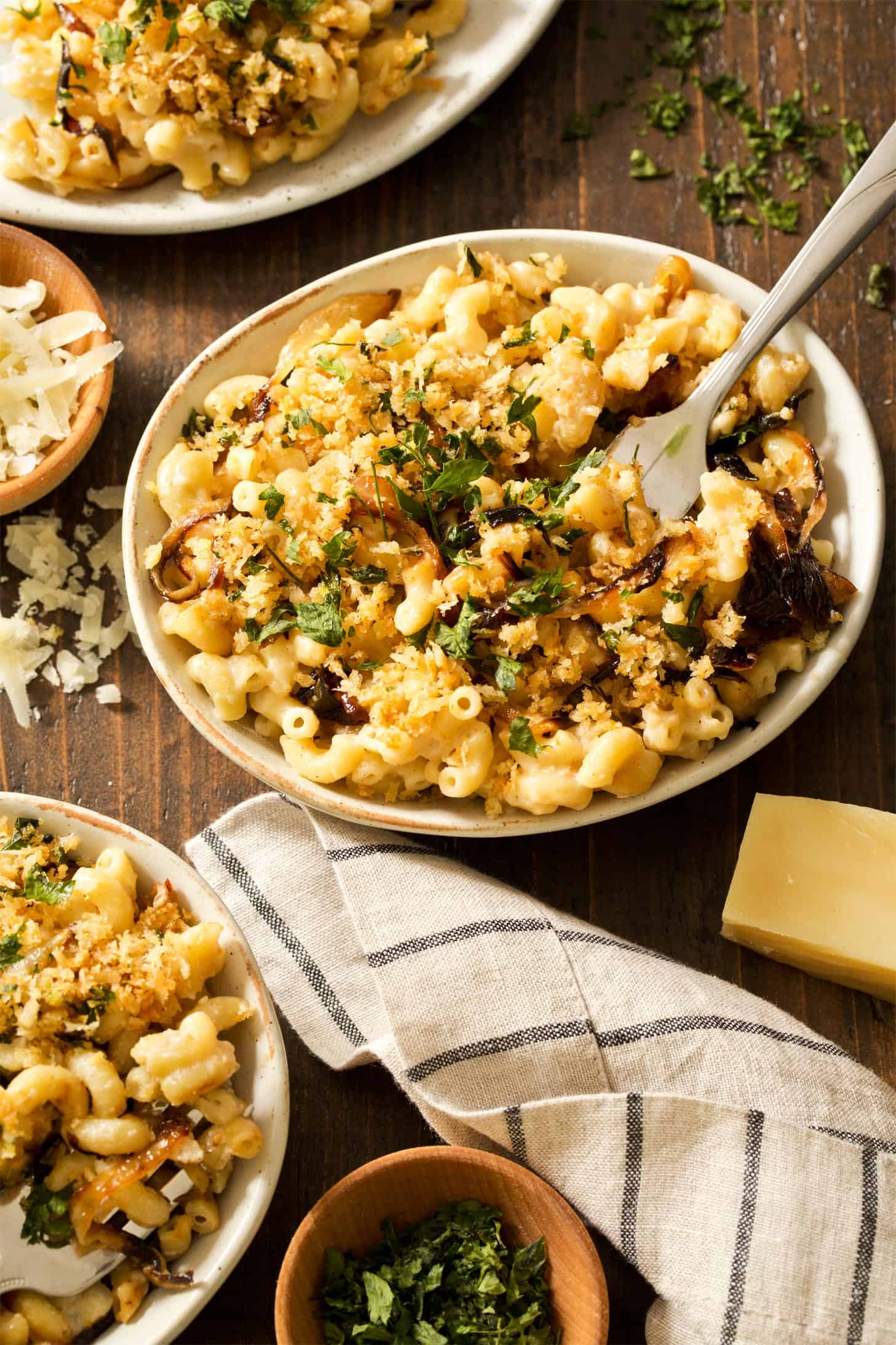 French onion mac and cheese recipe in bowl with fork