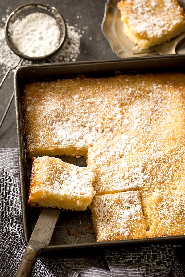 No need to drive to St. Louis when you're craving St Louis Gooey Butter Cake - a flat, dense cake with gooey, buttery center topped with a touch of powdered sugar. Grab your fork and dig it! 