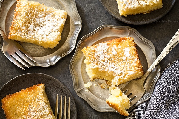 No need to drive to St. Louis when you're craving St Louis Gooey Butter Cake - a flat, dense cake with gooey, buttery center topped with a touch of powdered sugar. Grab your fork and dig it!