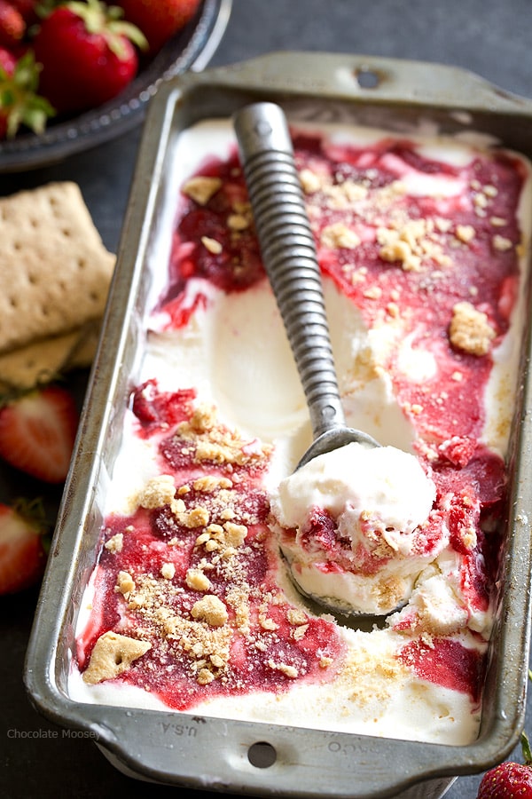 Craving cheesecake but too hot to bake? This no cook eggless Strawberry Cheesecake Ice Cream layered with strawberry sauce and graham cracker crumbs will satisfy your sweet tooth even during summer's hottest days.