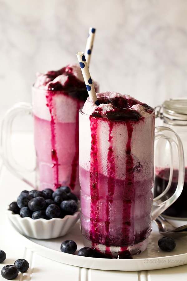 Enjoy summer in a glass with Blueberry Cream Soda Floats made with homemade blueberry soda and vanilla ice cream.