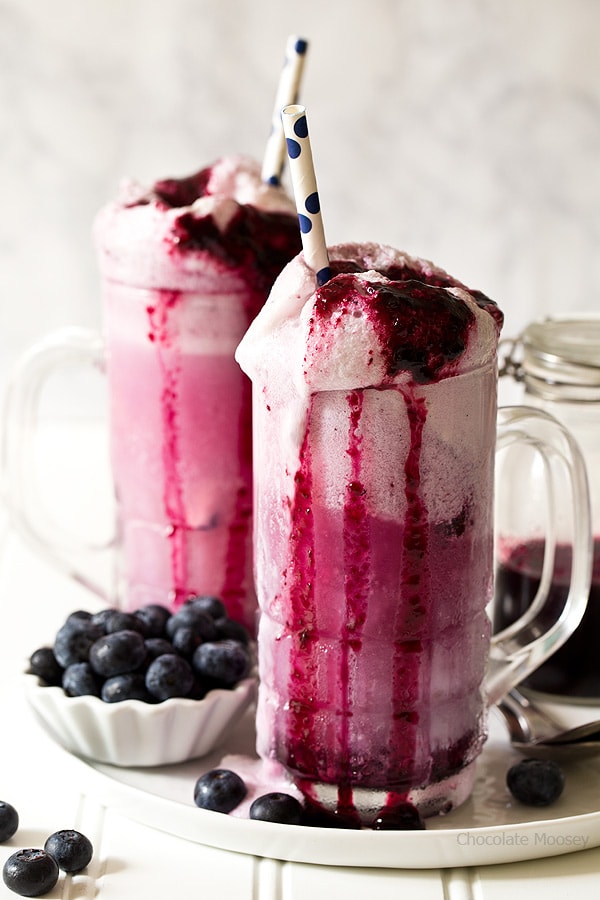 Enjoy summer in a glass with Blueberry Cream Soda Floats made with homemade blueberry soda and vanilla ice cream.