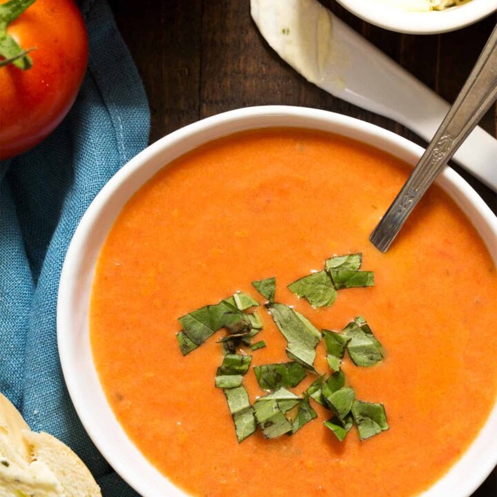 Close up of homemade tomato soup in white bowl