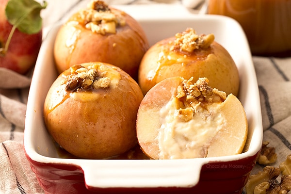 Cheesecake Stuffed Apples in red casserole dish