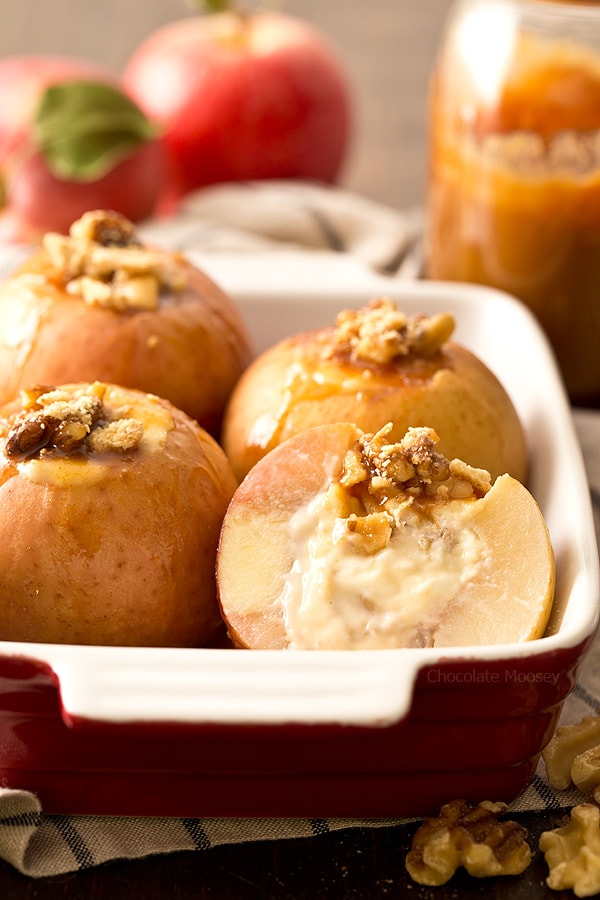 Cheesecake Stuffed Apples in red casserole dish