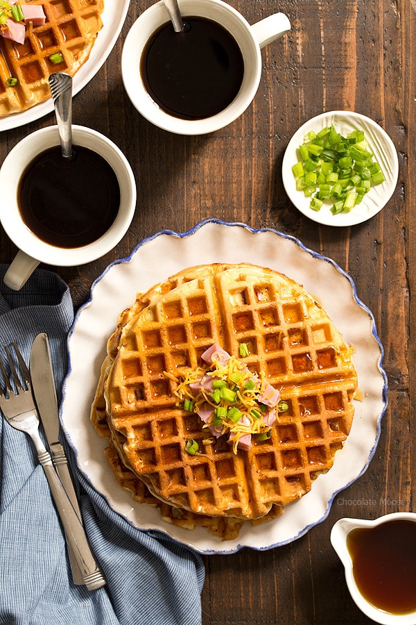 Ham and Cheese Waffles on a white ruffled plate