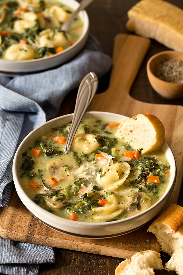 When there's a chill in the air, that means it's time for One Pot Spinach Mushroom Dumpling Soup - a hearty and filling dinner ready from prep to table in under 60 minutes. Made with spinach, mushrooms, carrots, and pelmeni dumplings.