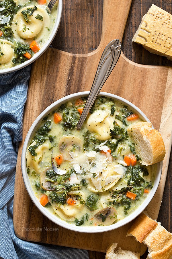 When there's a chill in the air, that means it's time for One Pot Spinach Mushroom Dumpling Soup - a hearty and filling dinner ready from prep to table in under 60 minutes. Made with spinach, mushrooms, carrots, and pelmeni dumplings.