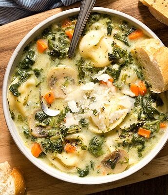 When there's a chill in the air, that means it's time for One Pot Spinach Mushroom Dumpling Soup - a hearty and filling dinner ready from prep to table in under 60 minutes. Made with spinach, mushrooms, carrots, and pelmini dumplings.