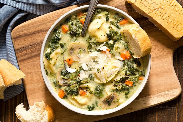 When there's a chill in the air, that means it's time for One Pot Spinach Mushroom Dumpling Soup - a hearty and filling dinner ready from prep to table in under 60 minutes. Made with spinach, mushrooms, carrots, and pelmeni dumplings.